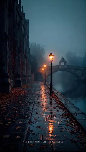 A wet towpath with gas lamps and fallen leaves leading to a stone bridge in the fog